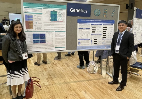 Genetics students in front of their posters at a Showcase event.